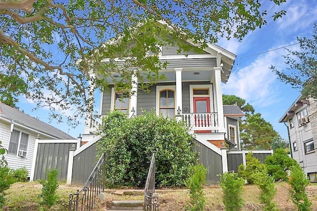 4445 Demontluzin St, New Orleans, LA 70122 - view of front of property with covered porch and stairway