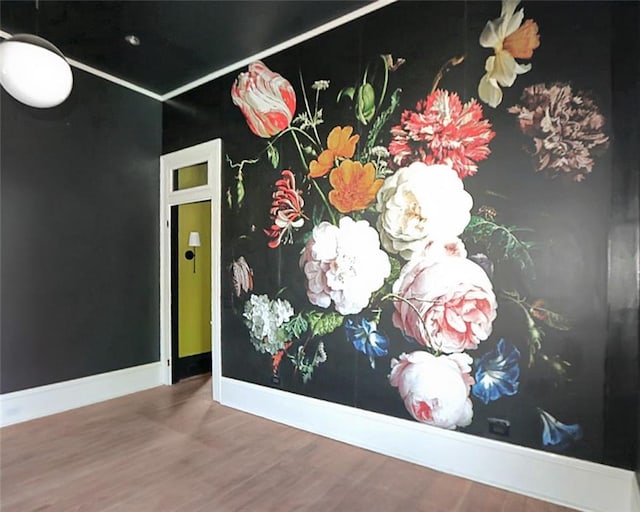 4445 Demontluzin St, New Orleans, LA 70122 - unfurnished room featuring wood finished floors and baseboards