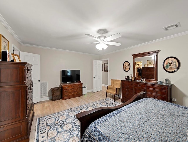 1104 Sena Dr, Metairie, LA 70005 - bedroom featuring light wood-style floors, ornamental molding, ceiling fan, and baseboards