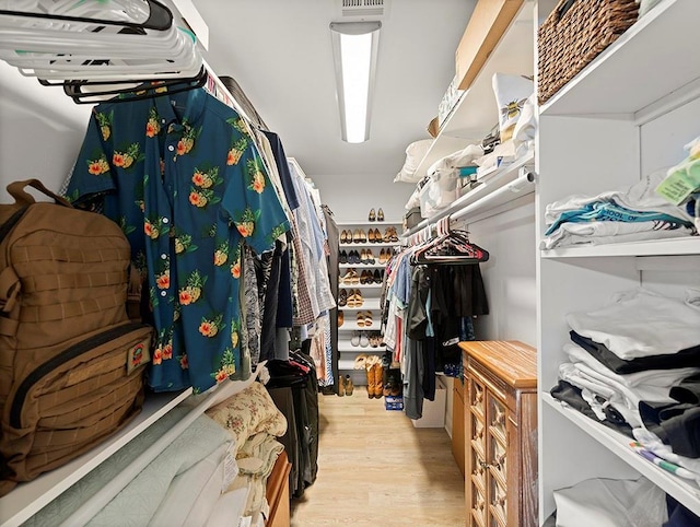 1104 Sena Dr, Metairie, LA 70005 - spacious closet featuring wood finished floors