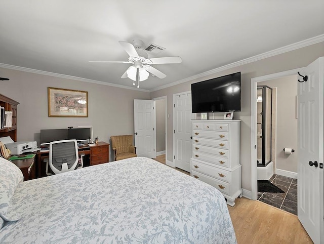 1104 Sena Dr, Metairie, LA 70005 - bedroom featuring crown molding, baseboards, ceiling fan, and a closet