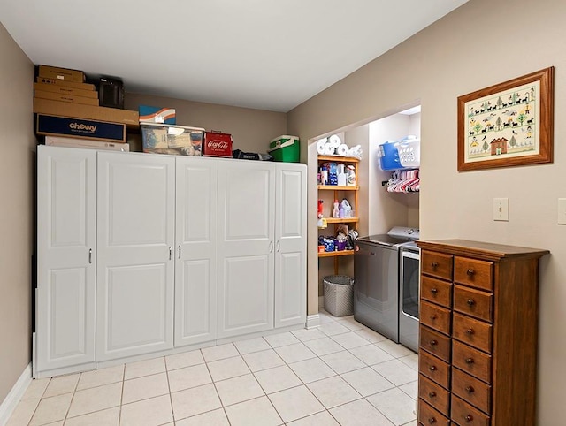 1104 Sena Dr, Metairie, LA 70005 - washroom featuring washing machine and dryer and light tile patterned floors
