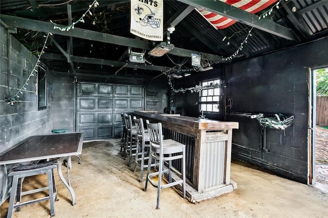727 Bonnabel Blvd, Metairie, LA 70005 - below grade area with concrete block wall and a bar