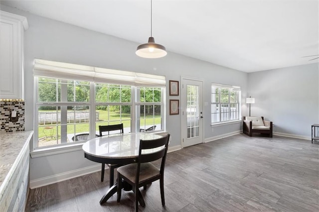 23375 Lowe Davis Rd, Covington, LA 70435 - dining area with wood finished floors and baseboards