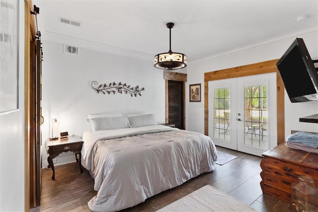 23375 Lowe Davis Rd, Covington, LA 70435 - bedroom with access to exterior, french doors, crown molding, and wood finished floors