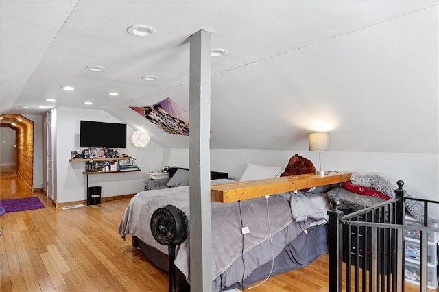 23375 Lowe Davis Rd, Covington, LA 70435 - bedroom with lofted ceiling, wood finished floors, baseboards, and recessed lighting