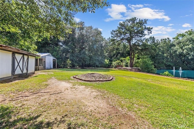 23375 Lowe Davis Rd, Covington, LA 70435 - view of green lawn featuring a water view
