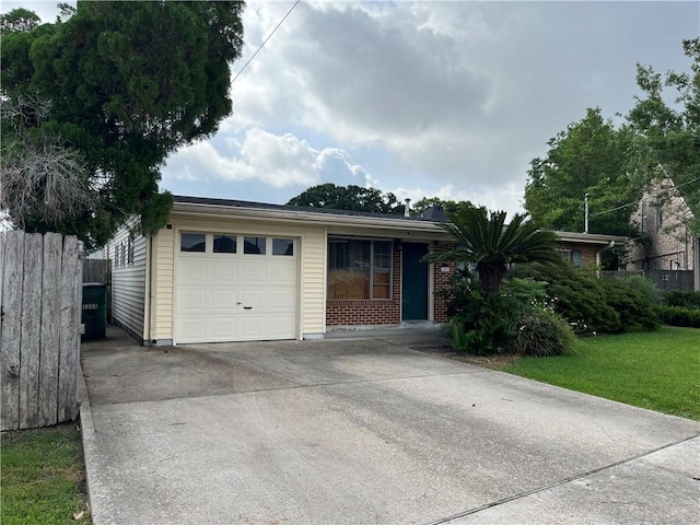 1309 Christopher Ct, Metairie, LA 70001 - single story home featuring a garage, concrete driveway, and brick siding
