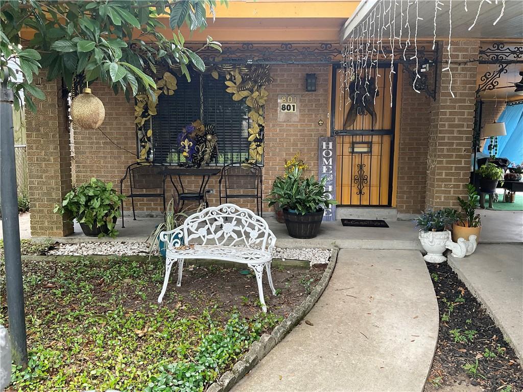 801 Napoleon Ave, New Orleans, LA 70115 - property entrance featuring brick siding