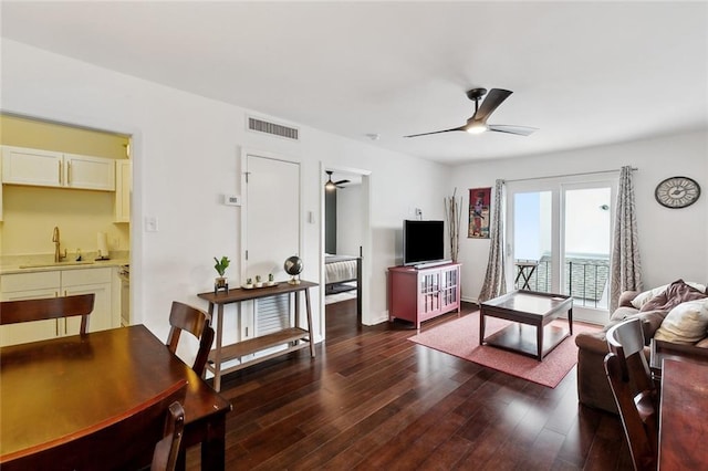 1422 Dauphine St Unit 8, New Orleans, LA 70116 - living room with ceiling fan and wood finished floors
