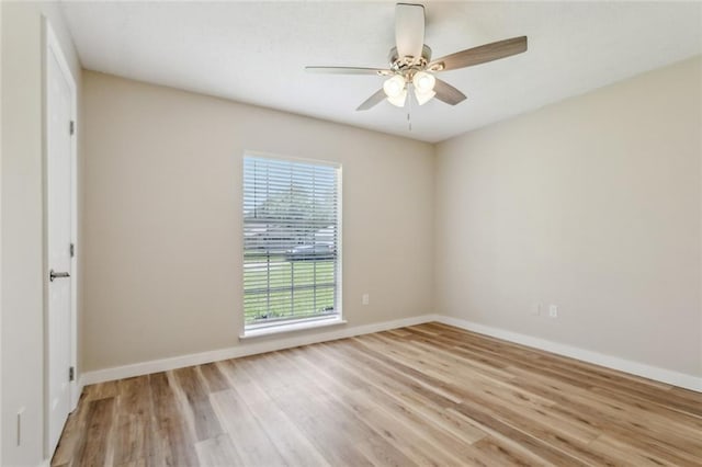 414 Pine Forest Dr, Slidell, LA 70458 - spare room featuring light wood finished floors, baseboards, and ceiling fan