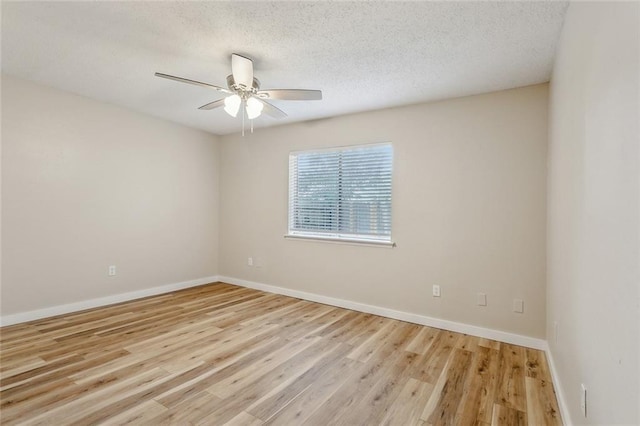 414 Pine Forest Dr, Slidell, LA 70458 - empty room featuring a ceiling fan, baseboards, light wood-style floors, and a textured ceiling