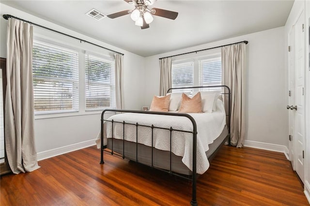 2300 Fenelon St, Chalmette, LA 70043 - bedroom with baseboards, wood finished floors, and a ceiling fan