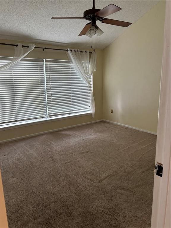 2836 Steamship Cir Unit A, River Ridge, LA 70123 - unfurnished room featuring a textured ceiling, carpet flooring, ceiling fan, and baseboards