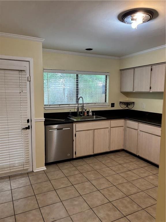 2836 Steamship Cir Unit A, River Ridge, LA 70123 - kitchen with stainless steel dishwasher, a sink, dark countertops, light brown cabinetry, and crown molding