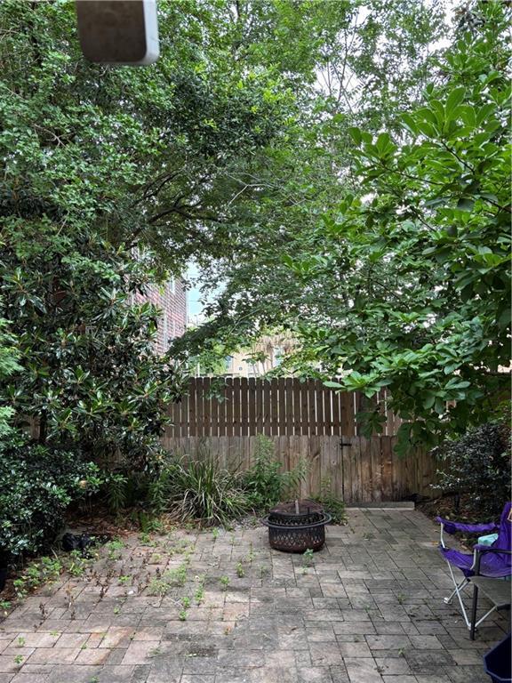 2836 Steamship Cir Unit A, River Ridge, LA 70123 - view of patio / terrace featuring a fire pit