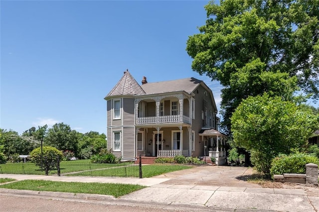 212 Linton Ave, Natchez-Ms, MS 39120 - victorian home with a porch, a balcony, and a chimney