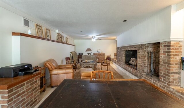 212 Linton Ave, Natchez-Ms, MS 39120 - living area featuring a fireplace and a ceiling fan