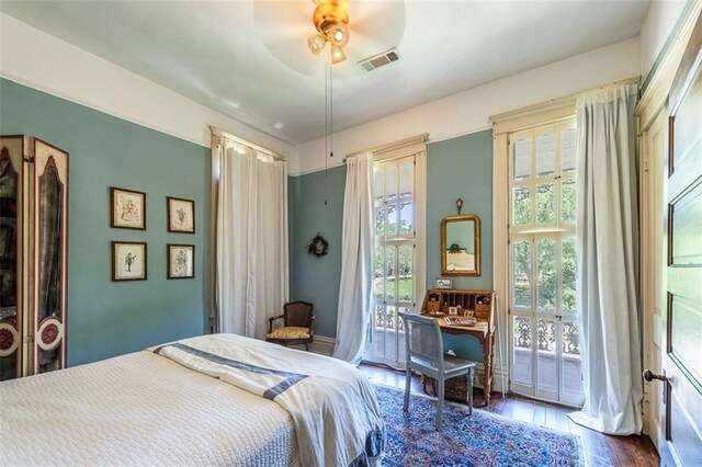 212 Linton Ave, Natchez-Ms, MS 39120 - bedroom with access to outside, wood finished floors, and ceiling fan