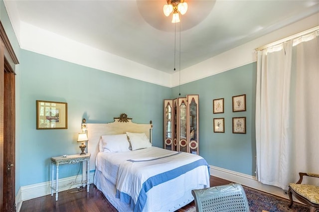 212 Linton Ave, Natchez-Ms, MS 39120 - bedroom with baseboards, wood finished floors, and a ceiling fan