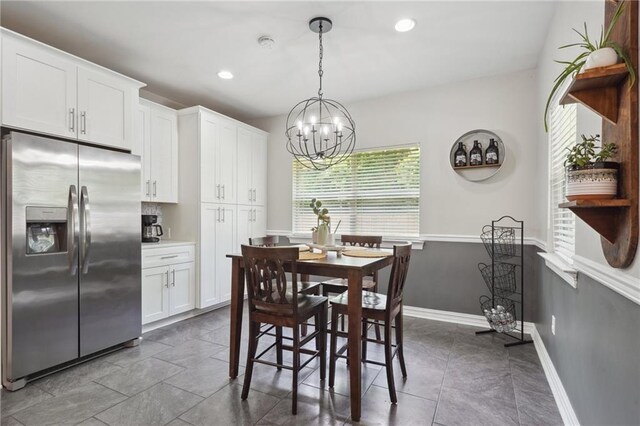 1400 Viola St, Mandeville, LA 70448 - dining space featuring a chandelier, recessed lighting, and baseboards
