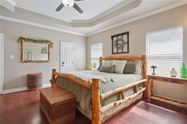 1400 Viola St, Mandeville, LA 70448 - bedroom with a raised ceiling, ornamental molding, wood-type flooring, baseboards, and a ceiling fan