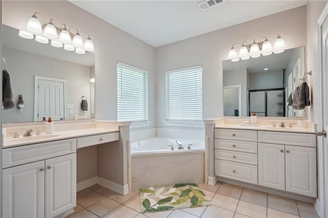 1400 Viola St, Mandeville, LA 70448 - bathroom with two vanities, a bath, tile patterned floors, and a shower stall