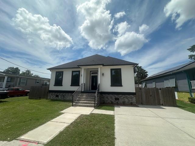 1731 Pratt Dr, New Orleans, LA 70122 - view of front of home featuring crawl space and stucco siding