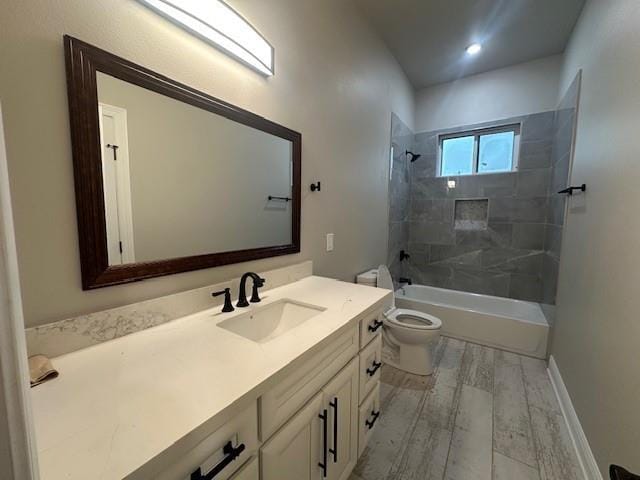 1731 Pratt Dr, New Orleans, LA 70122 - full bathroom featuring vanity, toilet, wood finished floors, bathtub / shower combination, and recessed lighting