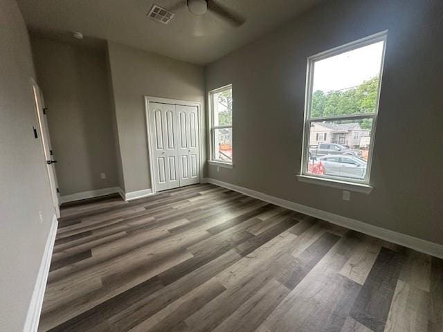1731 Pratt Dr, New Orleans, LA 70122 - unfurnished bedroom with wood finished floors, baseboards, and a closet