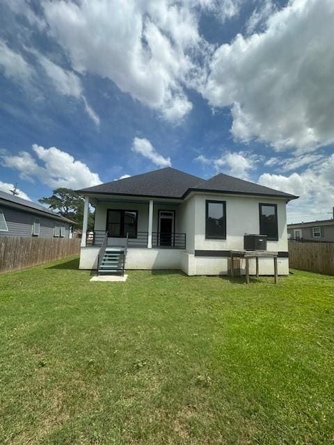 1731 Pratt Dr, New Orleans, LA 70122 - rear view of house featuring covered porch and stucco siding