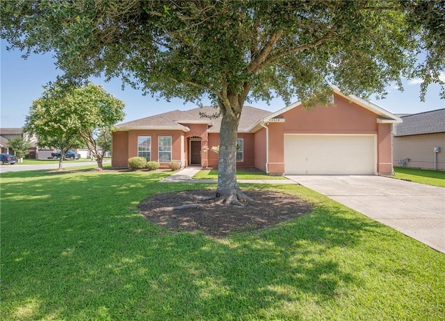 39070 Pirogue Ave, Gonzales, LA 70737 - ranch-style house featuring stucco siding, an attached garage, driveway, and a front yard