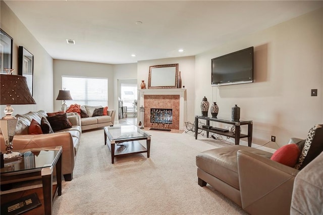 39070 Pirogue Ave, Gonzales, LA 70737 - living area featuring carpet floors, a fireplace, recessed lighting, and baseboards