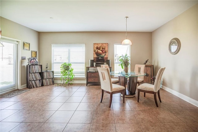 39070 Pirogue Ave, Gonzales, LA 70737 - tiled dining room with baseboards