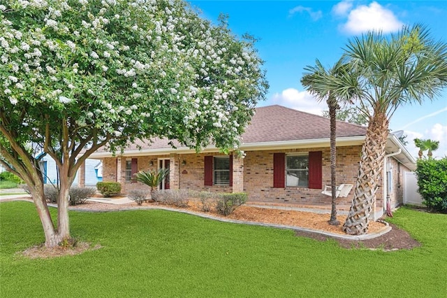 1825 Lake Superior Dr, Harvey, LA 70058 - single story home with a front yard, brick siding, and covered porch