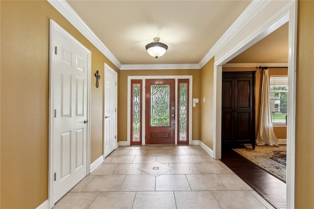 1825 Lake Superior Dr, Harvey, LA 70058 - foyer featuring crown molding, baseboards, and light tile patterned floors