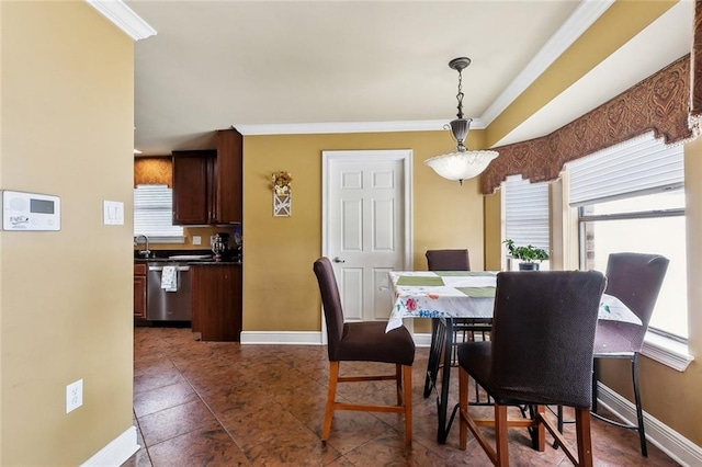 1825 Lake Superior Dr, Harvey, LA 70058 - dining room with baseboards, ornamental molding, and dark tile patterned floors