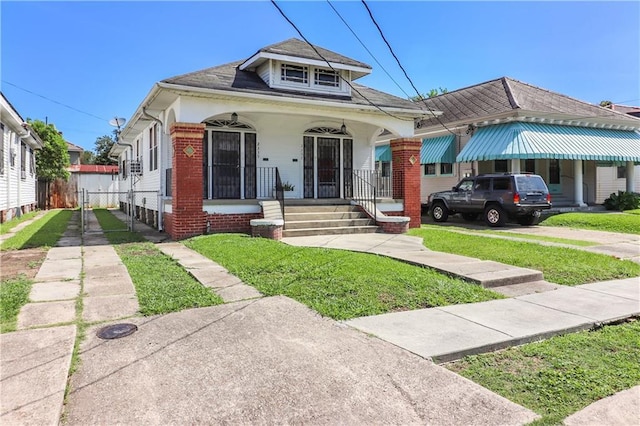 233537 Jasmine St, New Orleans, LA 70122 - view of front of house with covered porch and brick siding