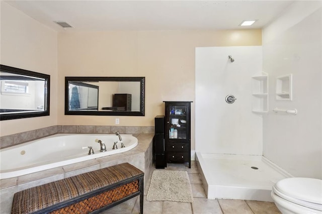 719 Atlantic Ave, New Orleans, LA 70114 - bathroom featuring toilet, a bath, tile patterned flooring, and a shower