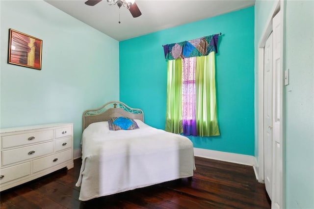 719 Atlantic Ave, New Orleans, LA 70114 - bedroom with dark wood-style floors, baseboards, and ceiling fan