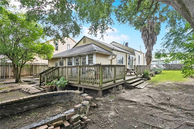 719 Atlantic Ave, New Orleans, LA 70114 - back of house with a wooden deck