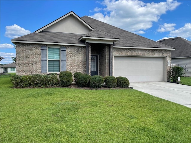 47715 Cathy Ln, Robert, LA 70455 - single story home with an attached garage, concrete driveway, a front yard, and brick siding