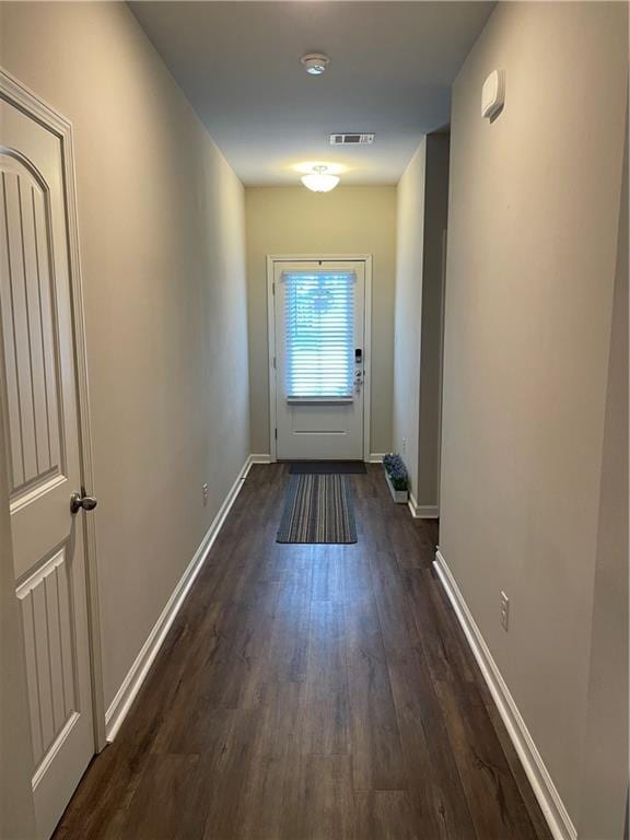 47715 Cathy Ln, Robert, LA 70455 - entryway with dark wood-type flooring and baseboards