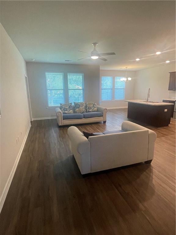 47715 Cathy Ln, Robert, LA 70455 - living room featuring baseboards, wood finished floors, a chandelier, recessed lighting, and a ceiling fan