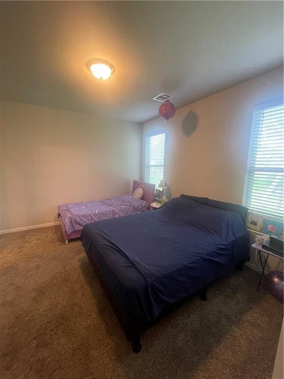 47715 Cathy Ln, Robert, LA 70455 - bedroom featuring carpet and baseboards