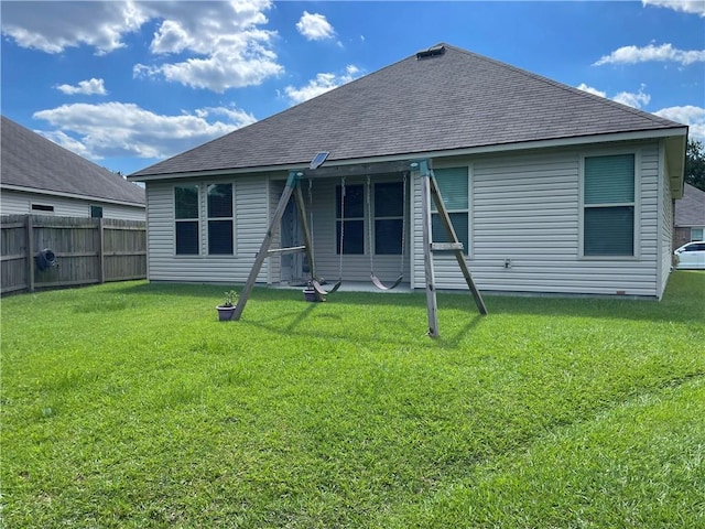 47715 Cathy Ln, Robert, LA 70455 - rear view of house featuring a shingled roof