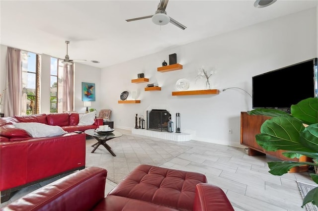 3213 Tolmas Dr, Metairie, LA 70002 - living area with a ceiling fan and baseboards