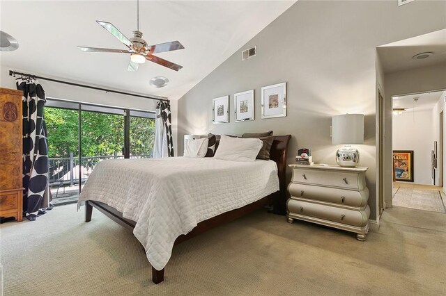 3213 Tolmas Dr, Metairie, LA 70002 - carpeted bedroom featuring vaulted ceiling, access to exterior, and a ceiling fan
