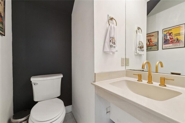 3213 Tolmas Dr, Metairie, LA 70002 - half bath with toilet, vanity, and tile patterned flooring