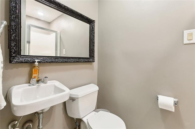 3213 Tolmas Dr, Metairie, LA 70002 - half bathroom featuring toilet and a sink